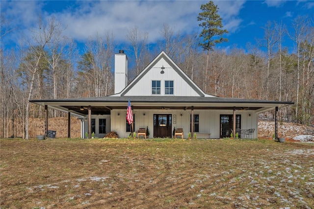 back of house with a porch