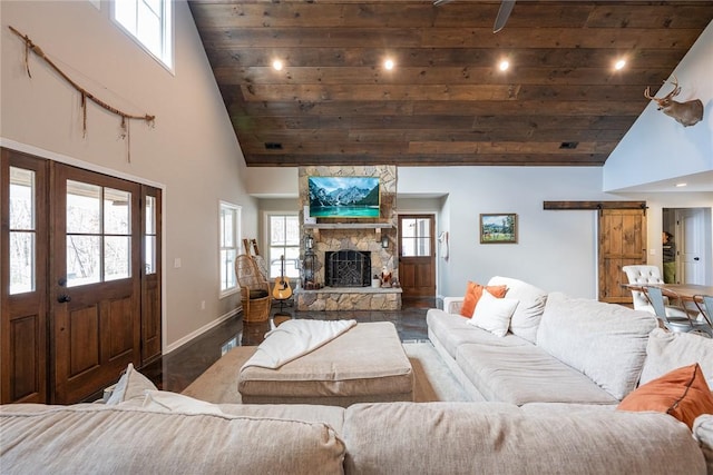 living room with a fireplace, a barn door, high vaulted ceiling, and wood ceiling