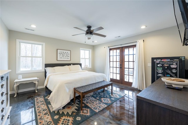 bedroom featuring ceiling fan and french doors