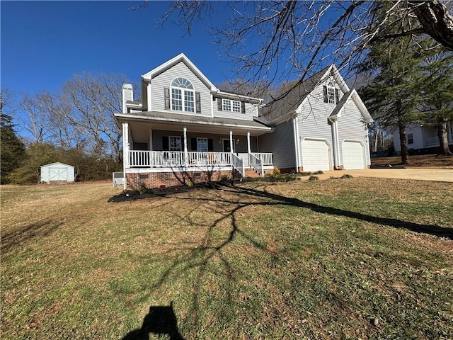 view of front of home featuring a front lawn, covered porch, and a shed