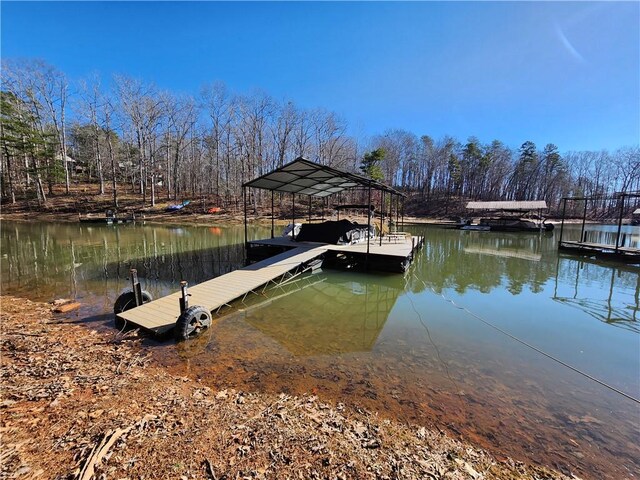 dock area featuring a water view