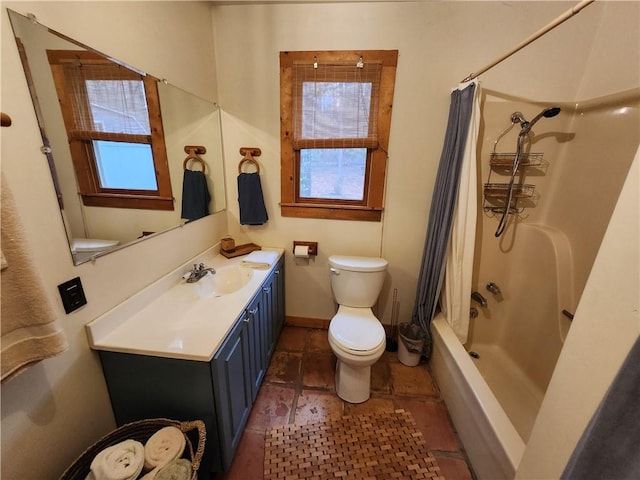 full bathroom with shower / bath combination with curtain, vanity, and toilet