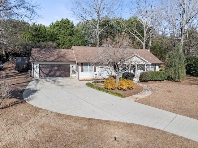 single story home featuring a garage