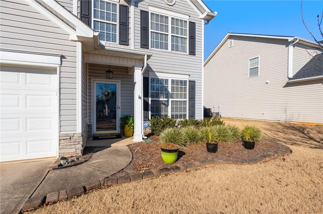 property entrance with a garage