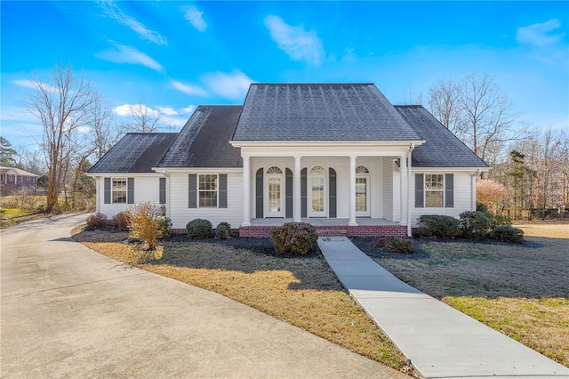 view of front of property with a front lawn and a porch