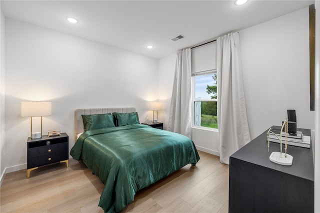 bedroom featuring light wood-type flooring