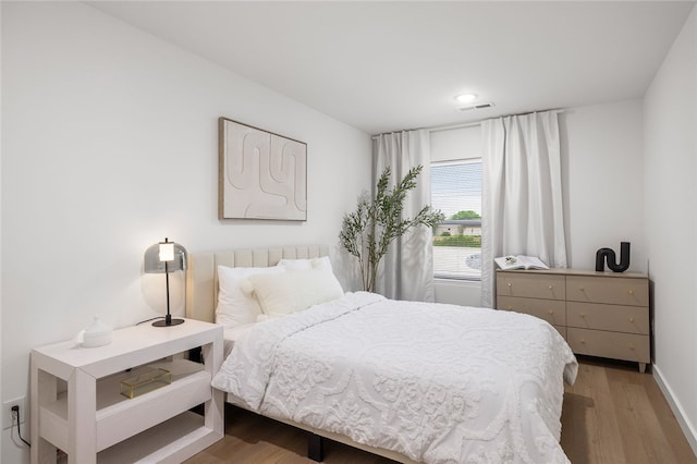 bedroom featuring light wood-type flooring