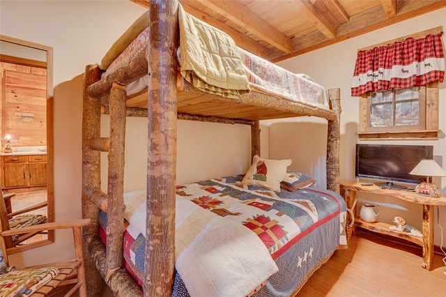 bedroom with wood-type flooring