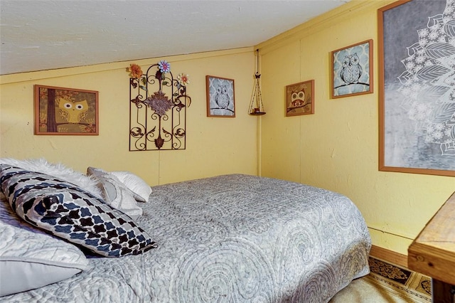 bedroom featuring lofted ceiling