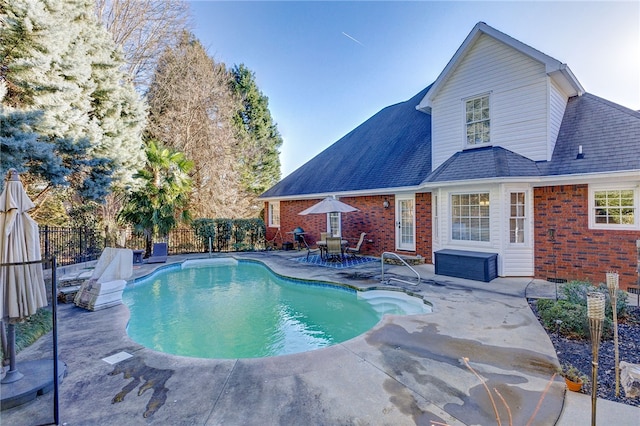 view of swimming pool featuring a patio area