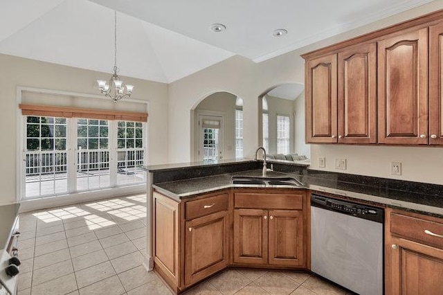 kitchen with an inviting chandelier, sink, stainless steel dishwasher, dark stone countertops, and light tile patterned floors