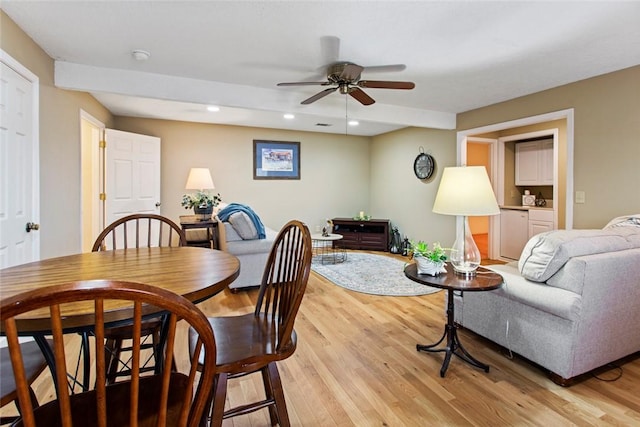 dining area with light wood-type flooring, ceiling fan, and recessed lighting