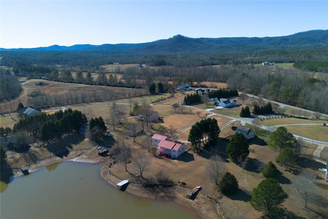 bird's eye view with a water and mountain view and a rural view