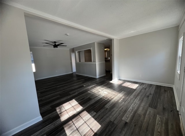 unfurnished living room with a textured ceiling, ceiling fan, and dark wood-type flooring