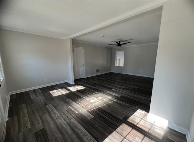 unfurnished living room with dark hardwood / wood-style floors, ceiling fan, and ornamental molding