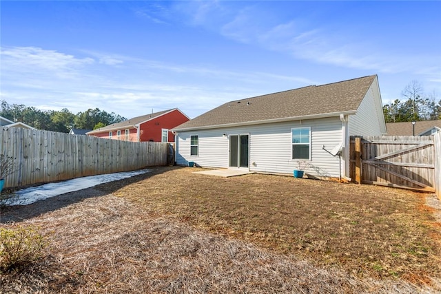 back of property with a patio area