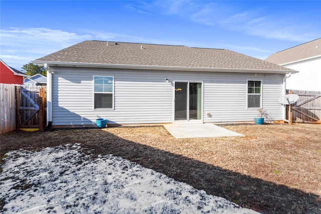 rear view of property featuring a patio