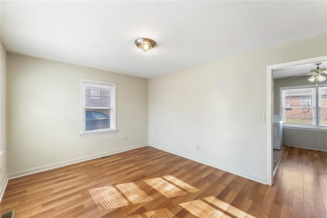 empty room with wood-type flooring