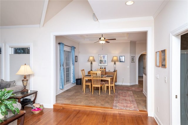 dining room with ceiling fan, hardwood / wood-style flooring, and crown molding