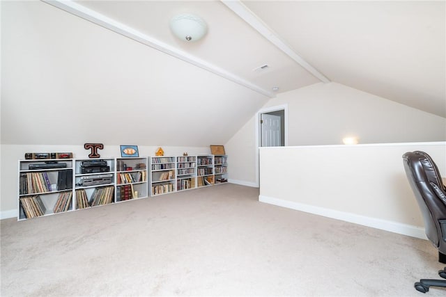 office space with vaulted ceiling and carpet