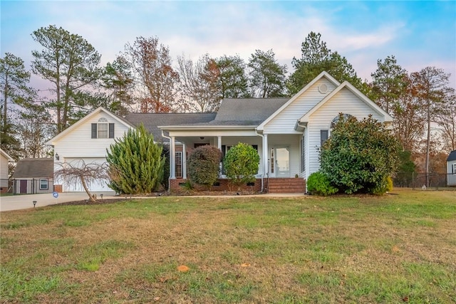 view of front of house with covered porch and a front lawn