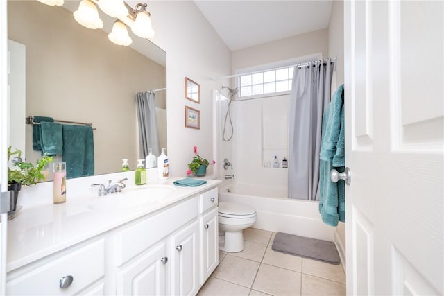 full bathroom featuring toilet, shower / bath combo, vanity, and tile patterned floors