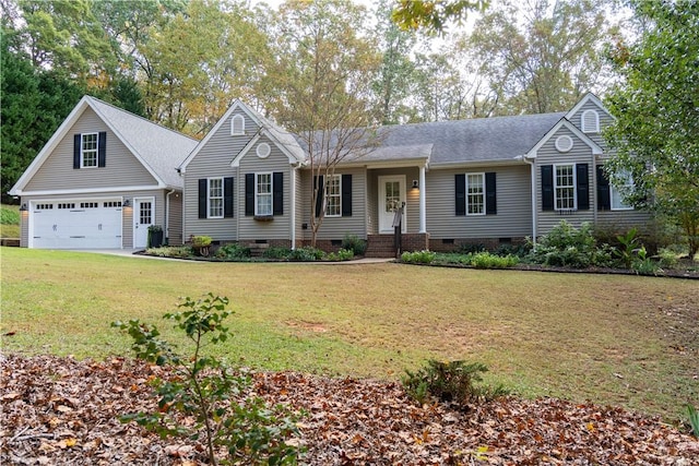 view of front of property with a garage and a front lawn