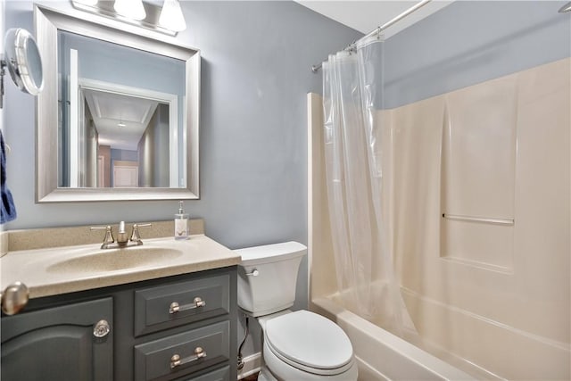 full bathroom featuring shower / tub combo, vanity, and toilet