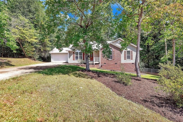 view of front facade with a front yard and a garage