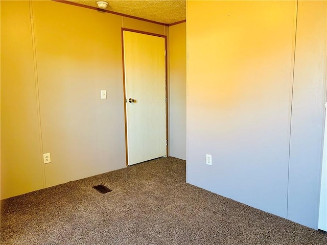 unfurnished bedroom featuring carpet