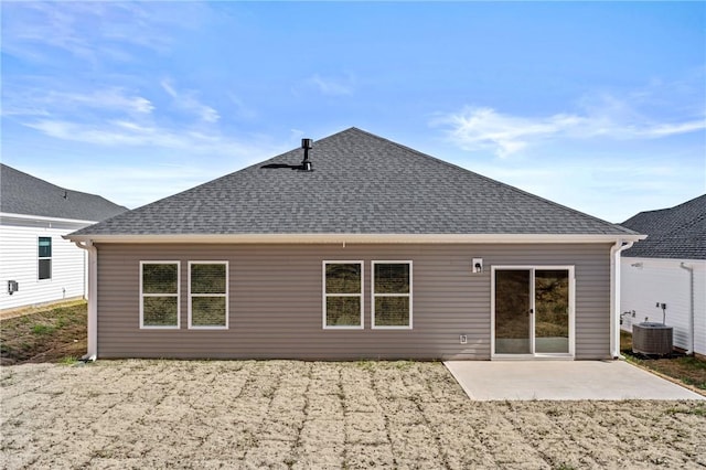 rear view of property with a patio and central AC unit