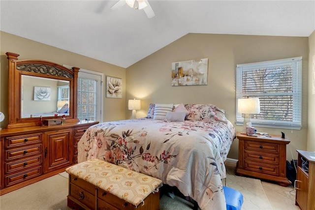 bedroom featuring lofted ceiling and ceiling fan