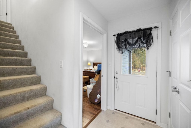 foyer featuring stairs