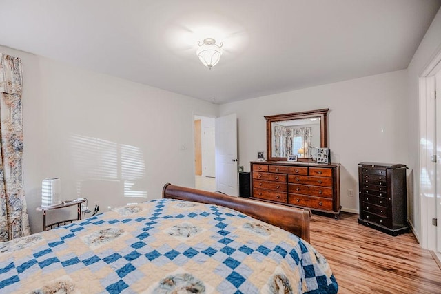 bedroom featuring light wood-style floors