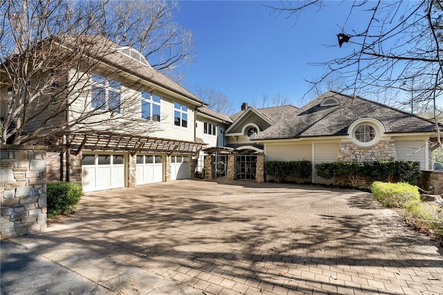 front of property with a garage