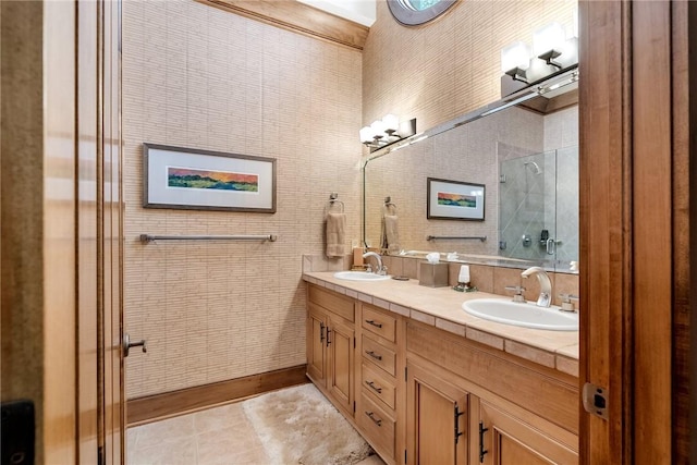 bathroom with vanity, tile patterned floors, and a shower with door