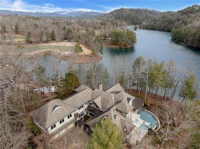 bird's eye view with a water and mountain view