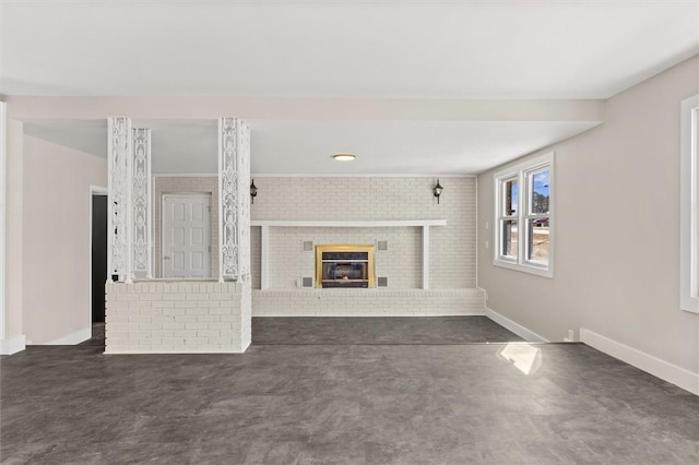 unfurnished living room with a brick fireplace