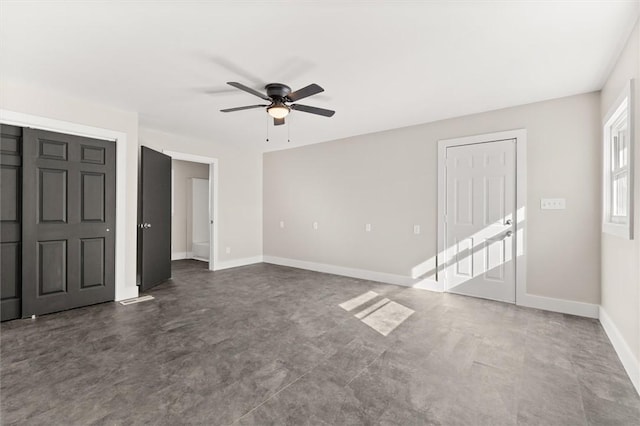 interior space featuring ceiling fan