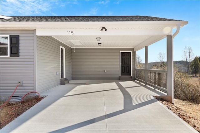 view of patio / terrace featuring a carport