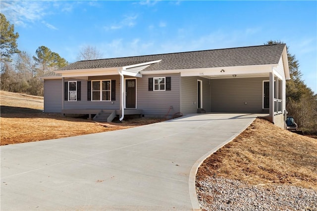 ranch-style home featuring a carport