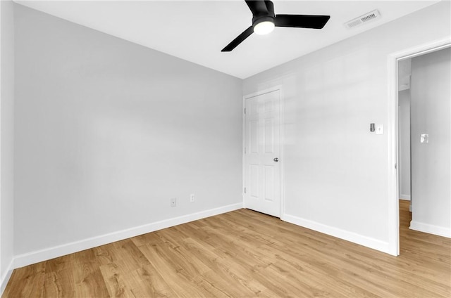 unfurnished bedroom with ceiling fan and light hardwood / wood-style floors