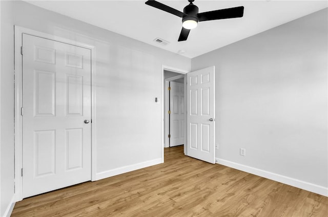 unfurnished bedroom featuring a closet, ceiling fan, and light hardwood / wood-style floors