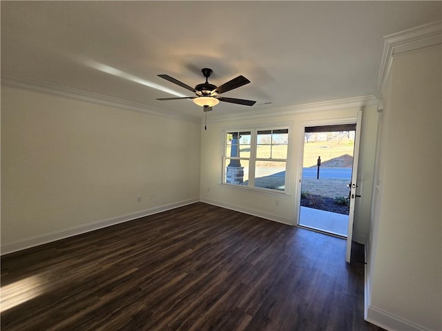 unfurnished room featuring ceiling fan, crown molding, and dark hardwood / wood-style flooring