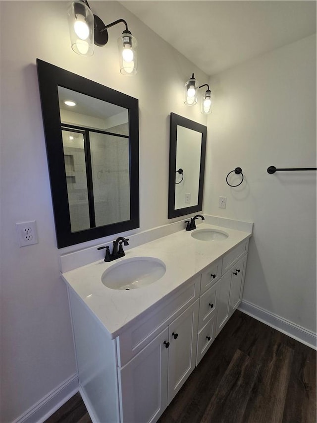 bathroom featuring vanity and hardwood / wood-style flooring