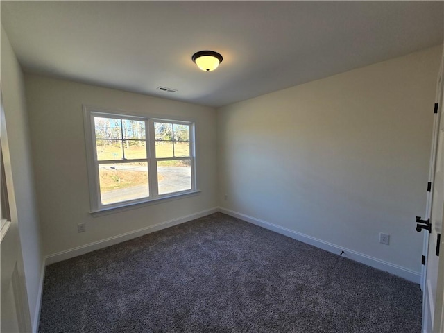 view of carpeted spare room