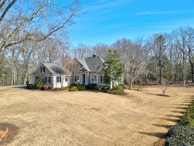 view of front of house with a front lawn