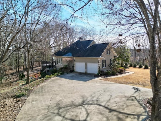 view of property exterior featuring a garage