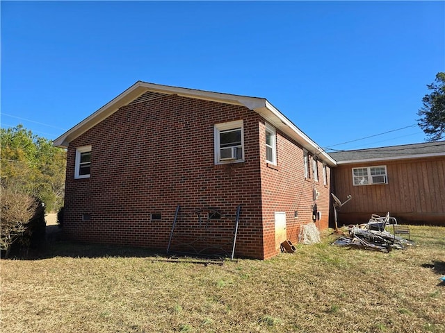 view of home's exterior featuring a lawn