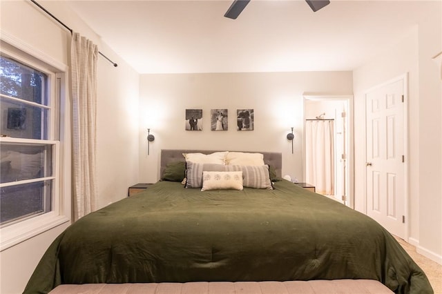 bedroom with ceiling fan and carpet flooring